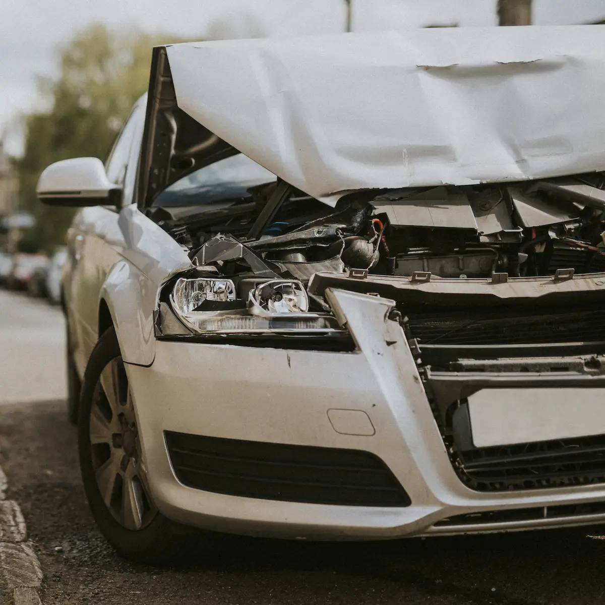 wrecked car on baton rouge street personal injury concept